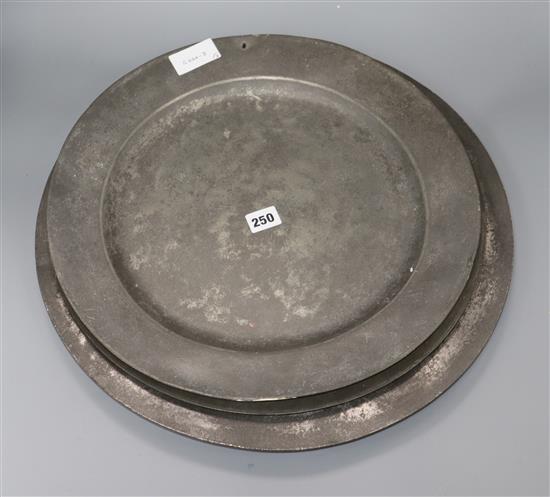 Three pewter chargers